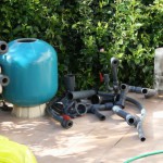 Bead filter being replaced by ERIC Three units on koi pond in Spain