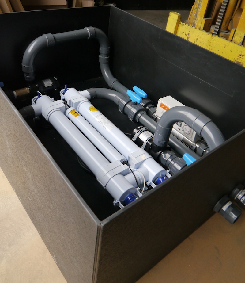 Equipment housing box containing UV and heater and pump