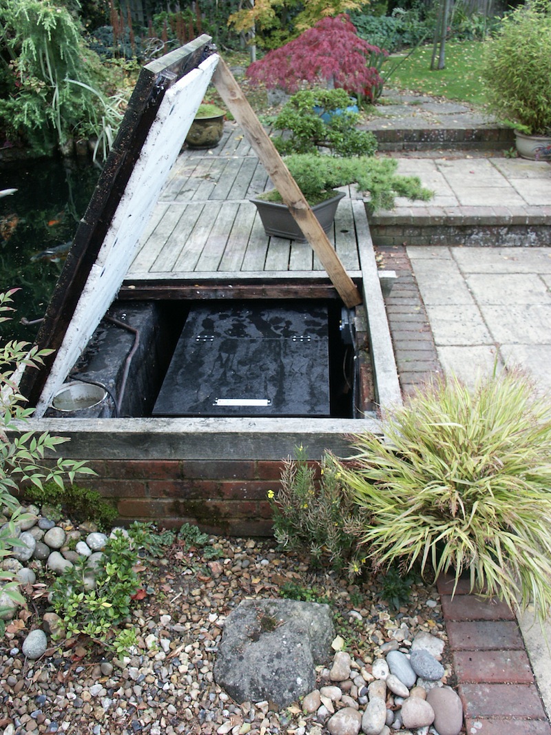 Converted filter pit with ample access to flush the ERIC Four