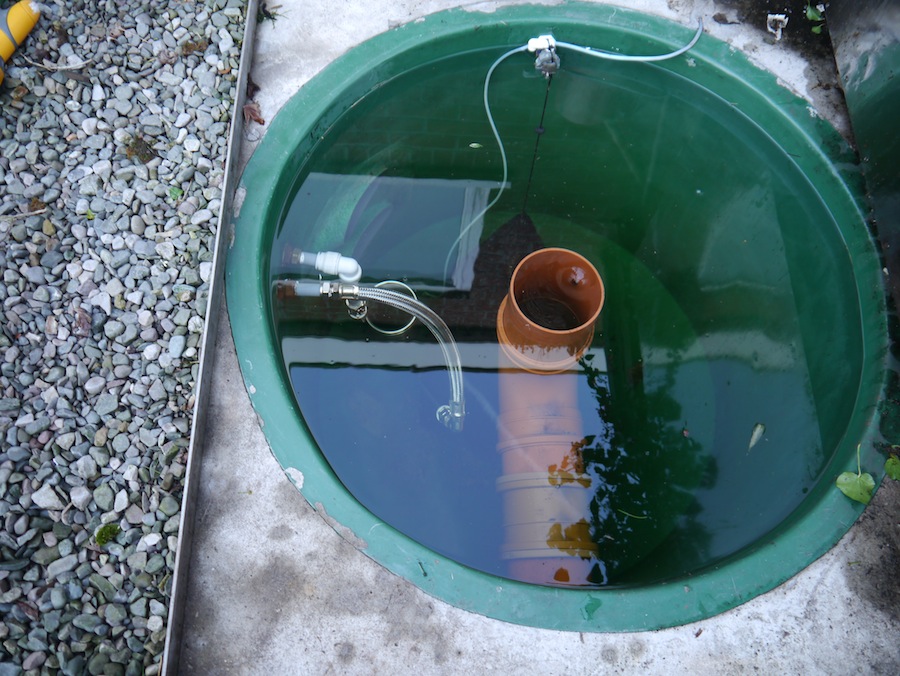 Picture showing a vortex unit filtering a koi pond