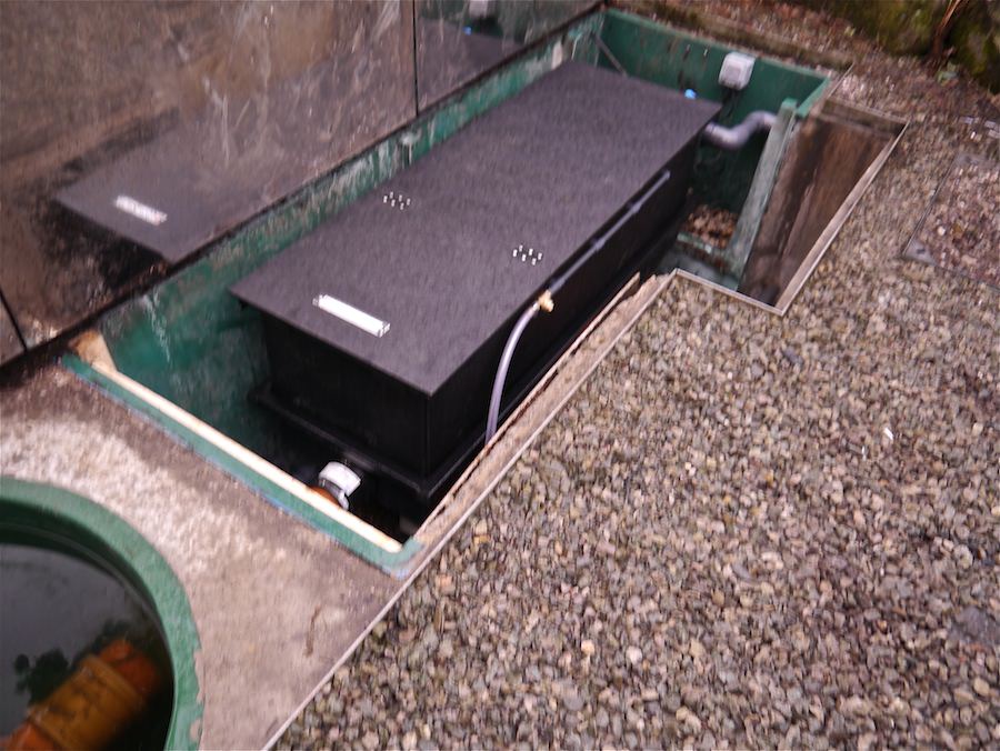 ERIC Three shown running on koi pond with lid down showing the space saved using an ERIC Three