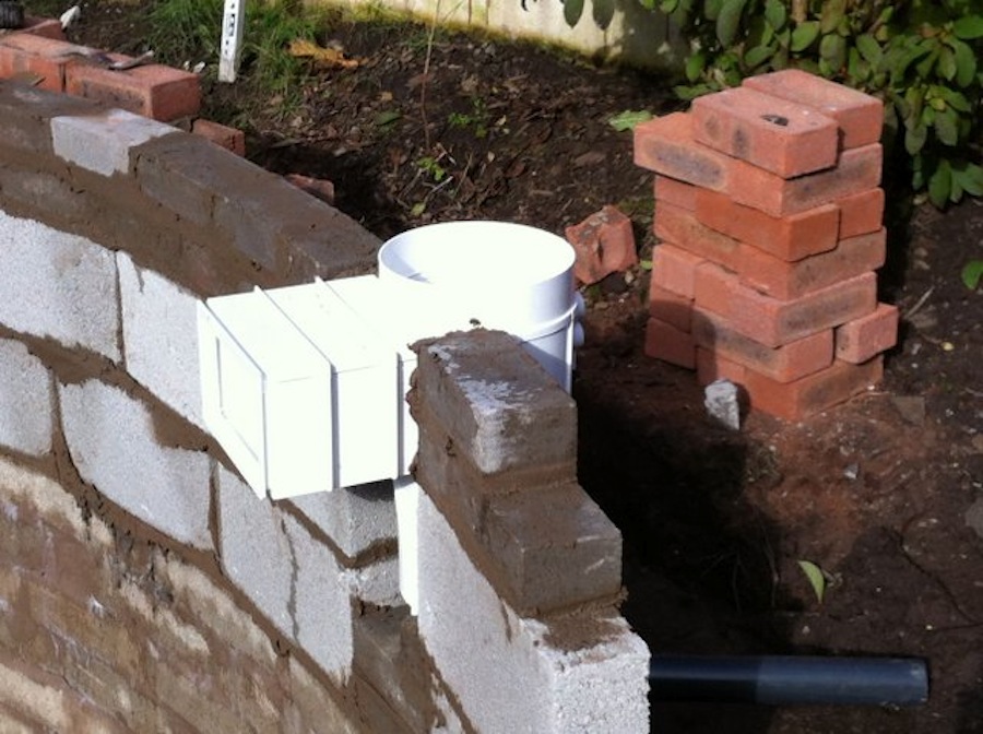 Wall mounted skimmers being installed