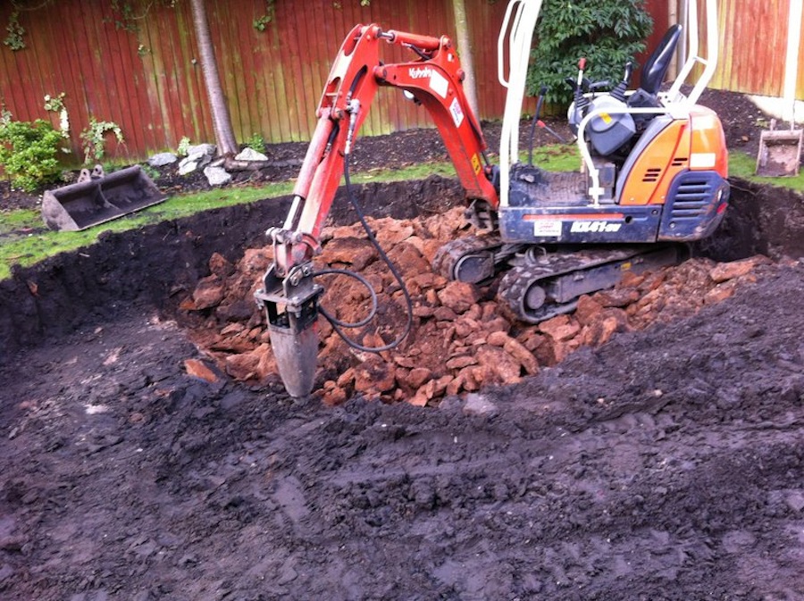 Excavator hit solid bedrock 1